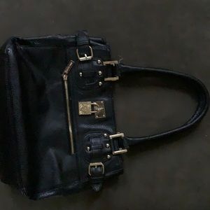 Used Black Anne Klein Purse. Good condition.